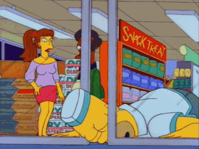 Homer-Simpson-Passes-Out-After-A-Long-Day-Working-At-The-Kwik-E-Mart