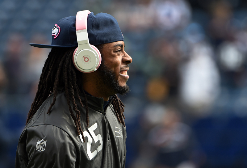 SEATTLE, WA - OCTOBER 12:  Cornerback Richard Sherman #25 of the Seattle Seahawks wears 'Beats by Dr. Dre' headphones as he warms up before the game against the Dallas Cowboys at CenturyLink Field on October 12, 2014 in Seattle, Washington.  (Photo by Steve Dykes/Getty Images)