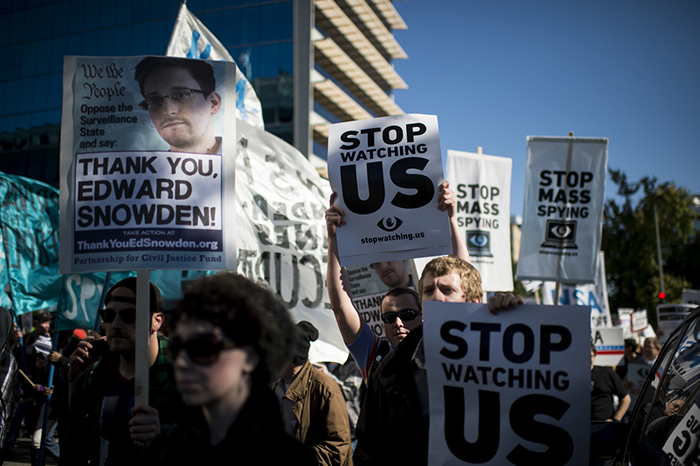 UNITED STATES - OCTOBER 26: NSA surveillance protesters, organized by the "Stop Watching Us" coalition, march from Union Station to the U.S. Capitol on Saturday, Oct. 26, 2013, to voice opposition to government's surveillance of online activity and phone calls . (Photo By Bill Clark/CQ Roll Call)