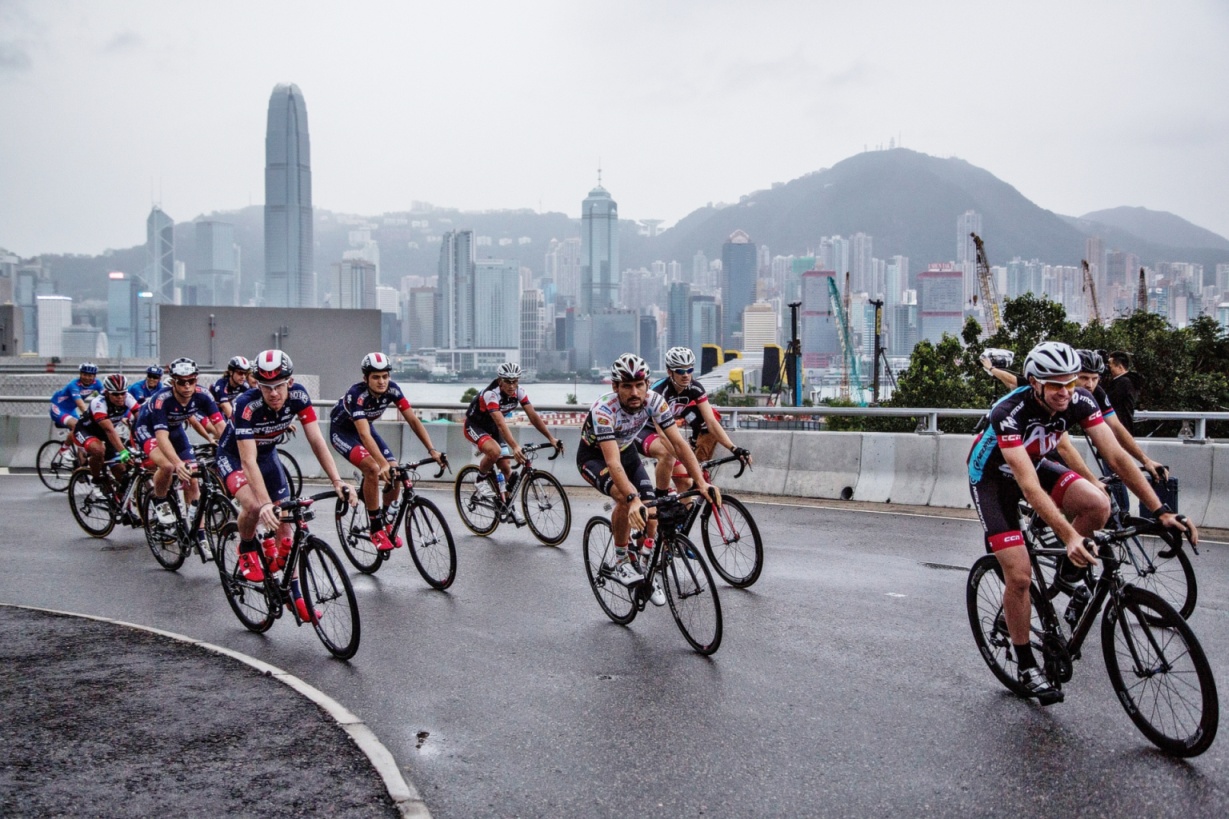 HONG KONG - OCTOBER 11:  Cyclists participate in a race during the Sun Hung Kai Properties Hong Kong Cyclothon on October 11, 2015 in Hong Kong. Hong Kong holds its first two-day bicycle race organised by the Hong Kong Tourism Boardm with Sun Hung Kai Properties. (Photo by Lam Yik Fei/Getty Images for Hong Kong Images)
