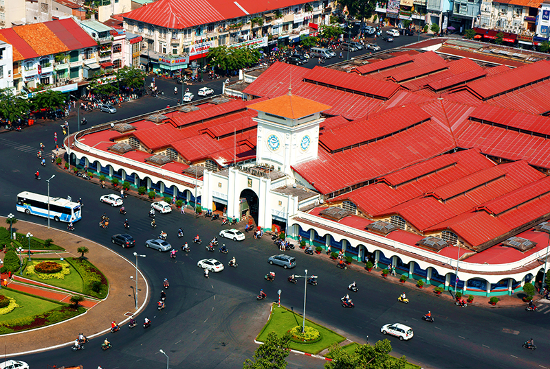 HO CHI MINH CITY, VIET NAM- MAR 23: Overview Ben Thanh market , this place is famous destination of Vietnam travel in Ho chi Minh, ancient architect, amazing row of house on day, VietNam, Mar 23, 2014